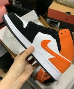 Air Jordan 1 Mid Black Orange Buckled